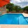 Private, shared pool with large sun-deck, where you can have your table + chairs for alfesco eating !