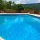 Private, shared pool with large sun-deck, where you can have your table + chairs for alfesco eating !