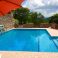 Private, shared pool with large sun-deck, where you can have your table + chairs for alfesco eating !