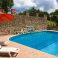 Private, shared pool with large sun-deck, where you can have your table + chairs for alfesco eating !