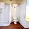 all 4 shower rooms similar - large and white